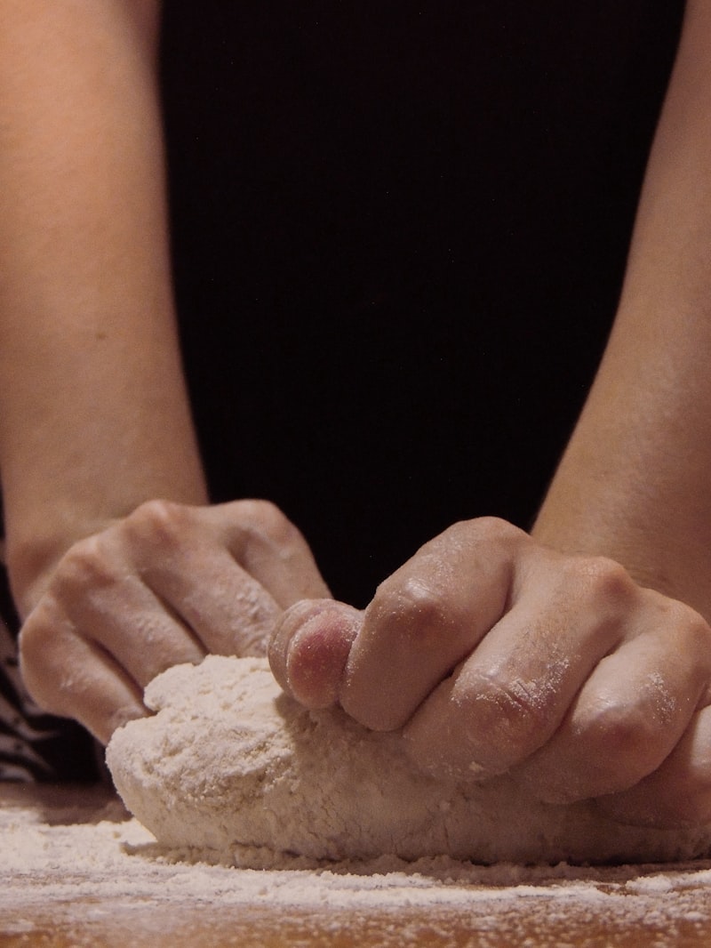 Baker kneading dough